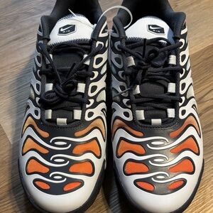 Nike Air Max Plus with Orange and Black Accents
